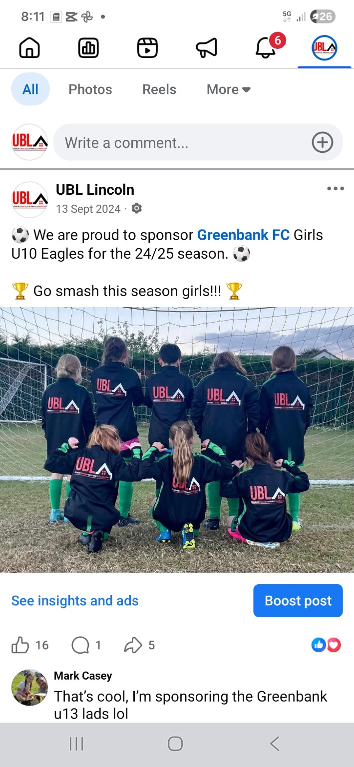 Greenbank FC Girls U10 Eagles wearing UBL-sponsored tops by the goal